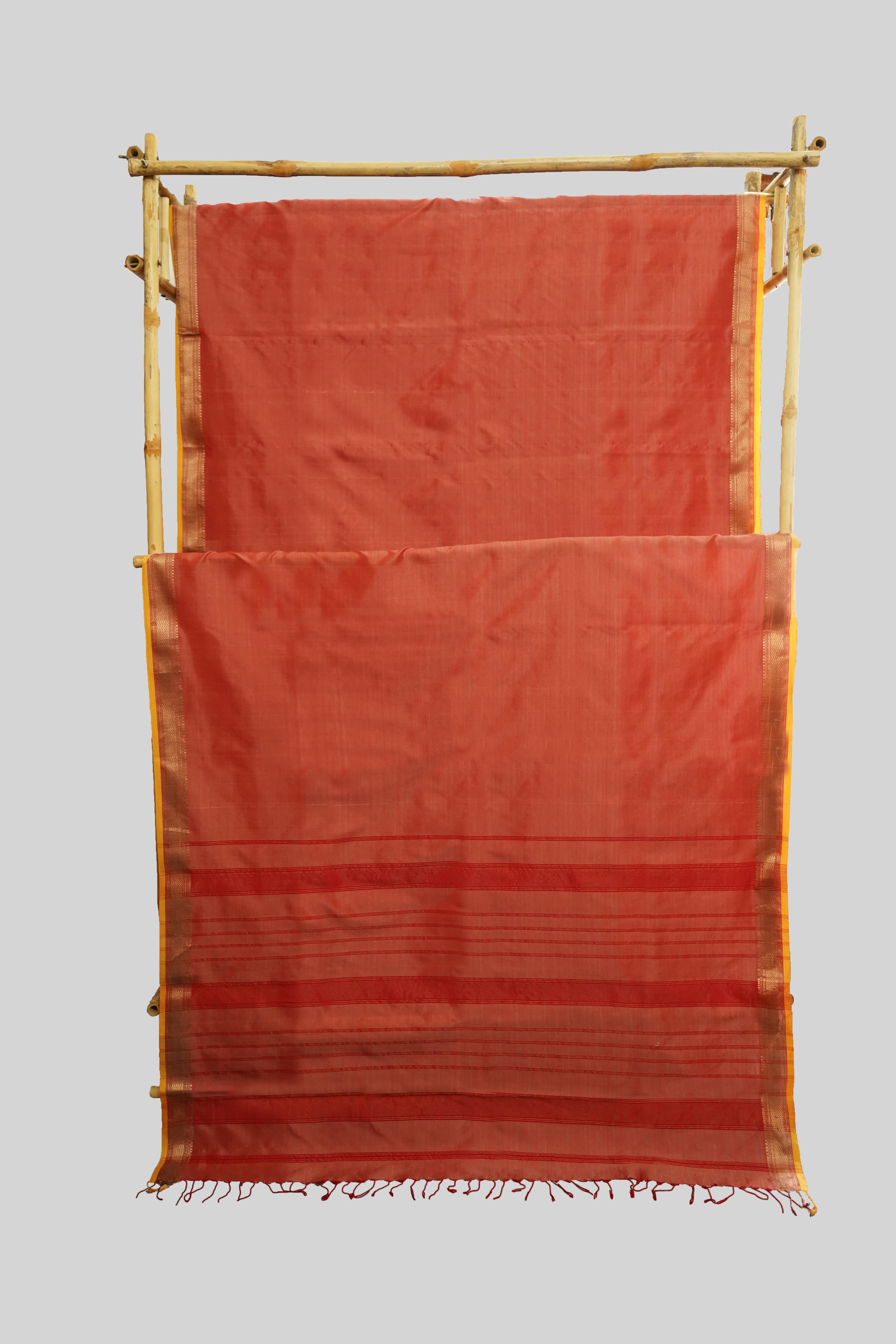 Coral Peach Maheshwari Silk Cotton Saree with Golden Zari Border & Striped Pallu |